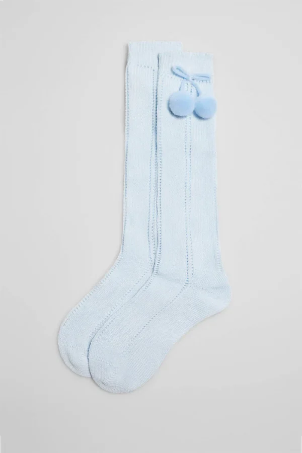 Calcetines calados largos infantiles Ysabel Mora con pompones