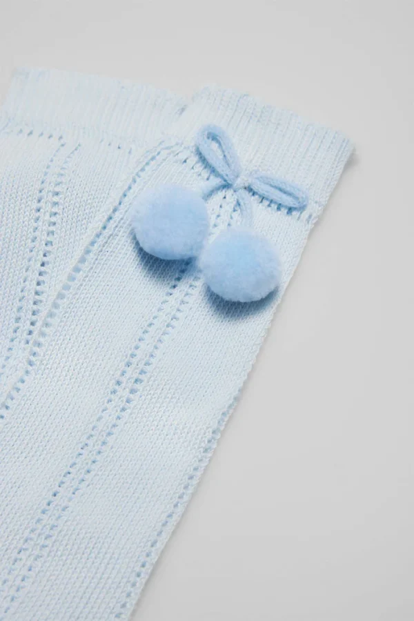 Calcetines calados largos infantiles Ysabel Mora con pompones